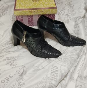 Brighton rhythm black laser calf boot, size 8.5 M